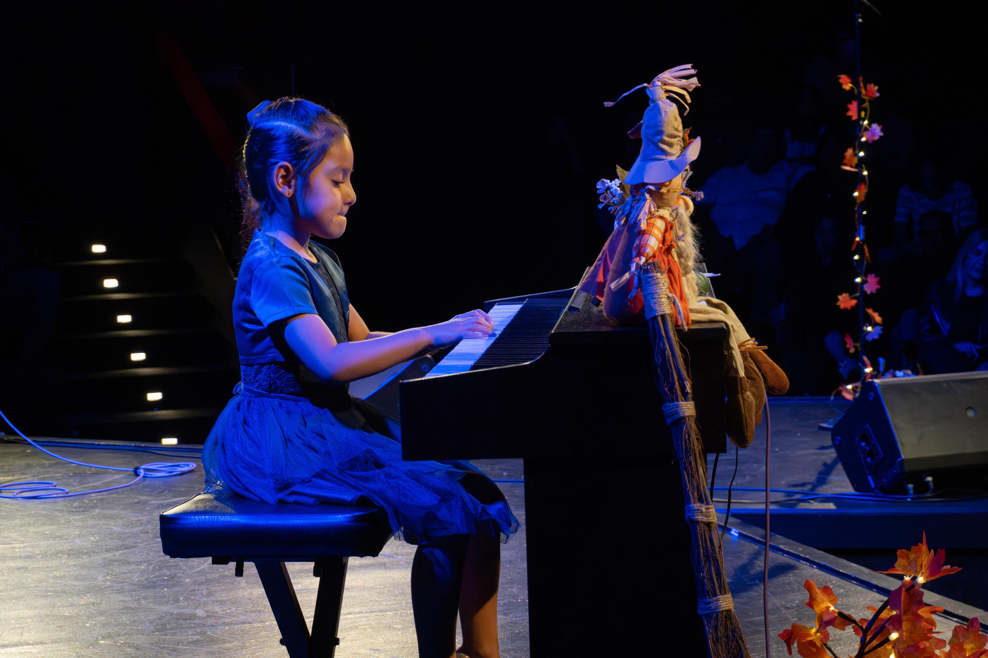Young pianist performing