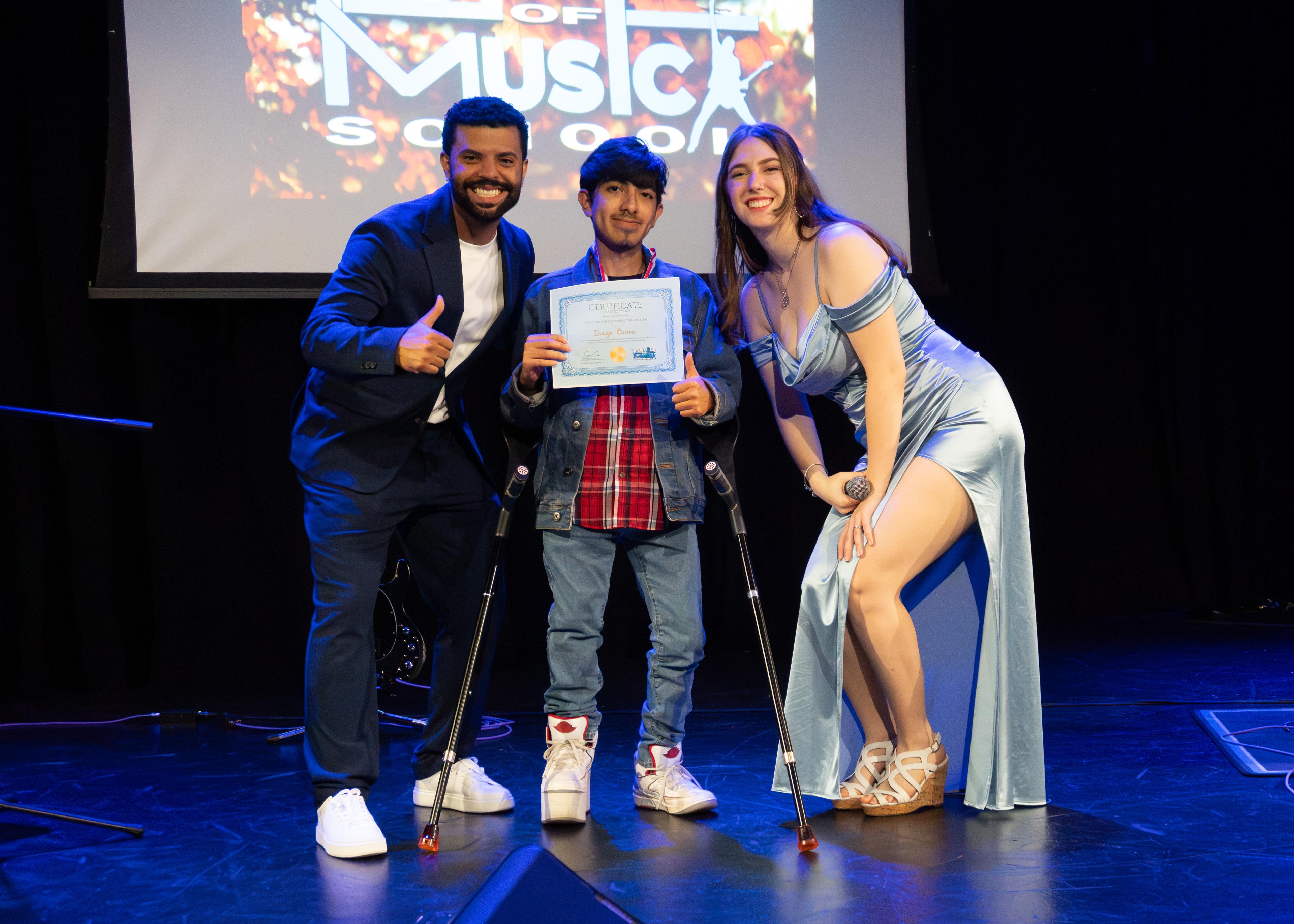 Student receiving award on stage