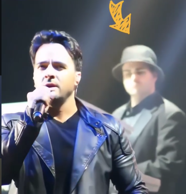 Max Acosta performing with Luis Fonsi at Nassau Coliseum